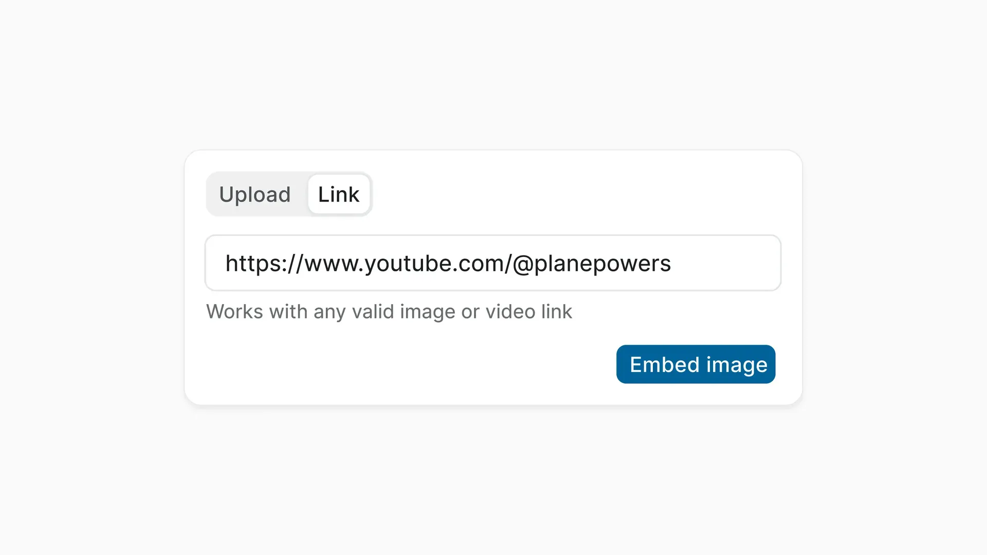 Editor modal for embedding images or videos using a URL link